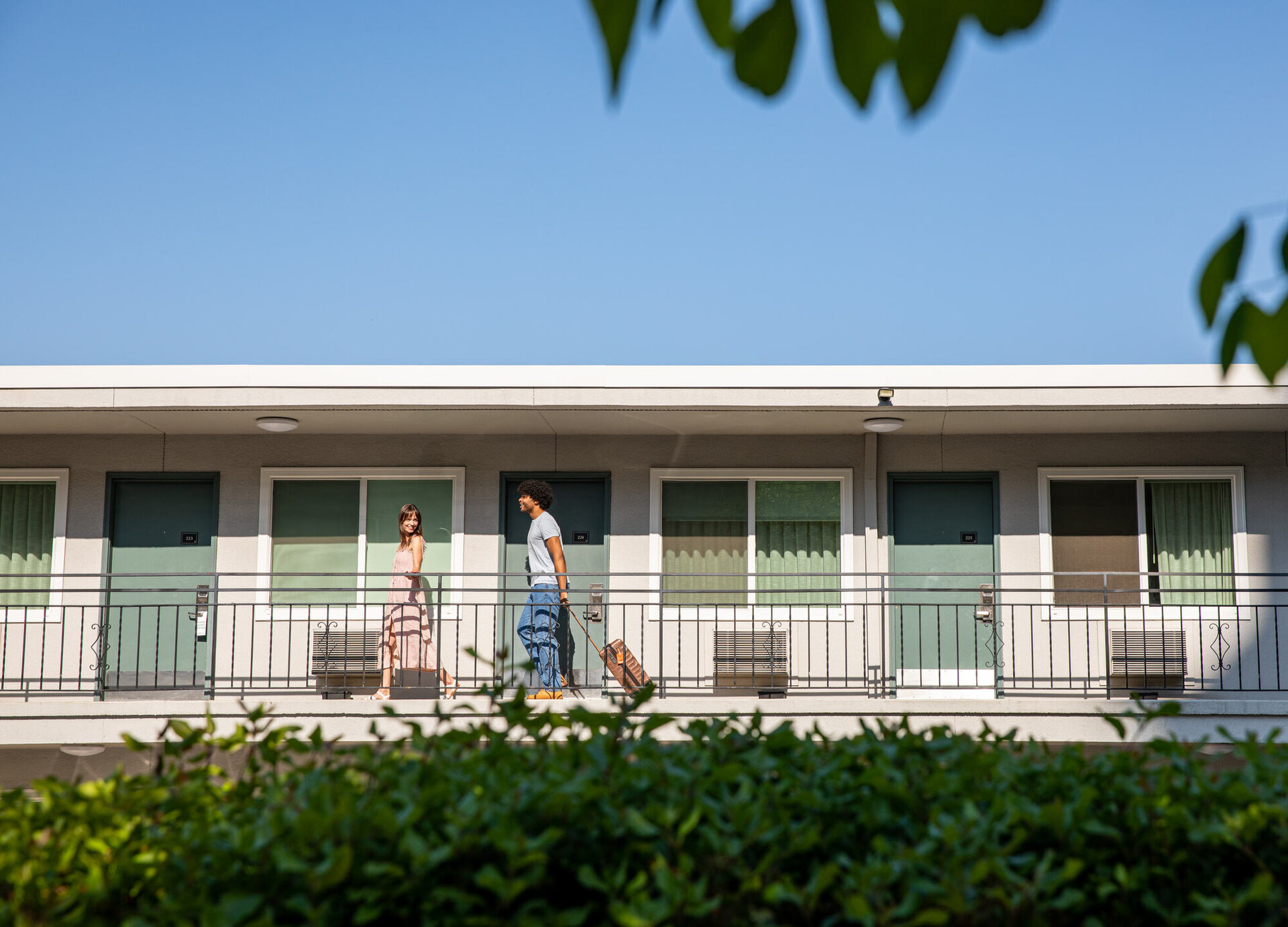 Two People Outside Inn