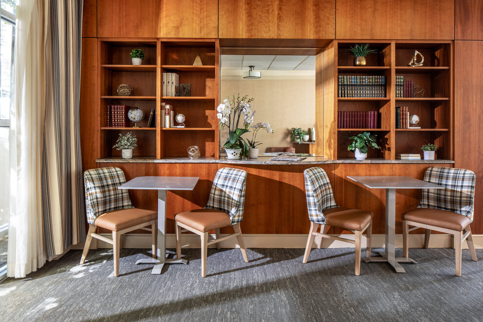 a room with a table and chairs